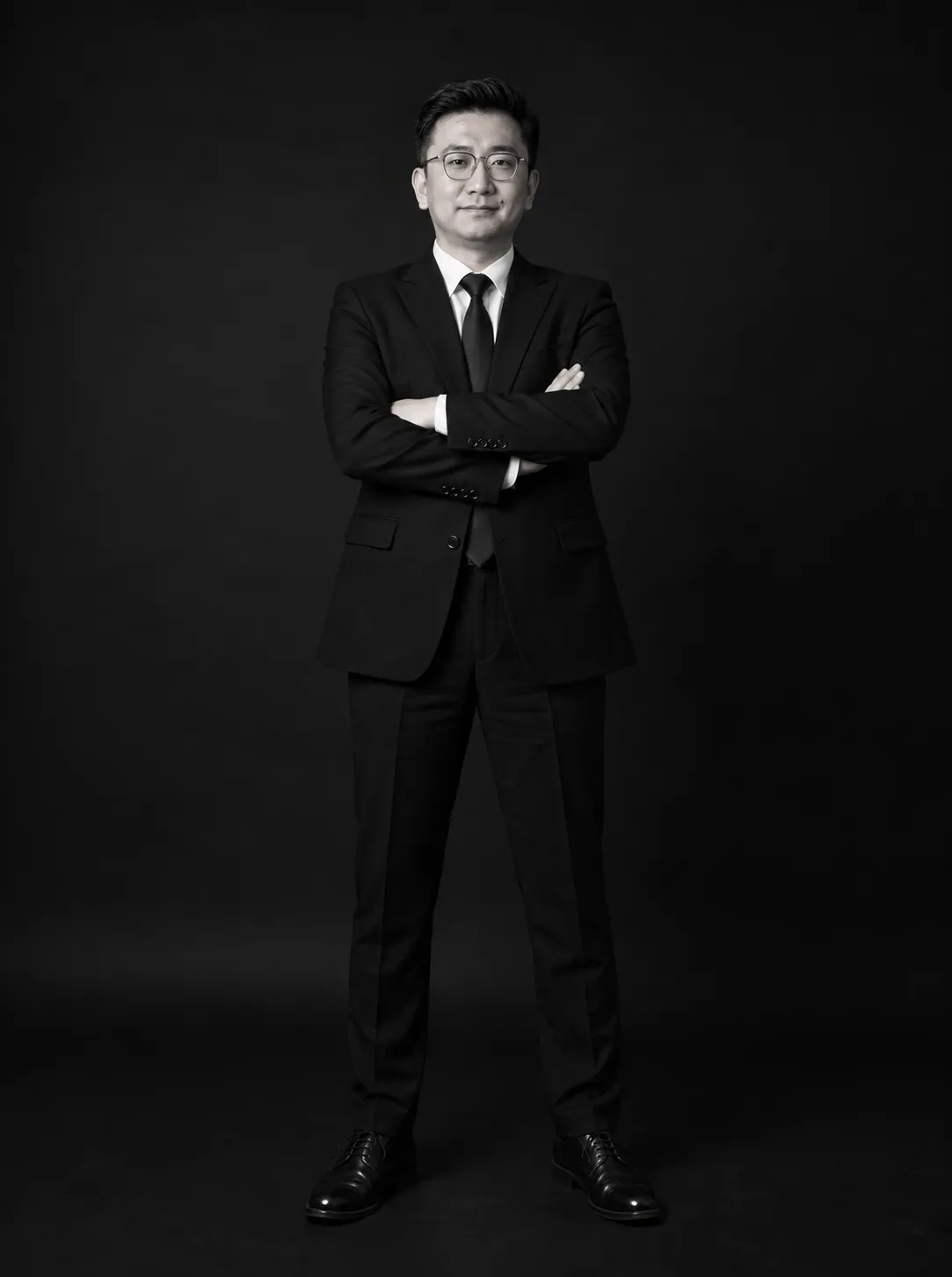 Black-and-white portrait of Andrew David W.Y.